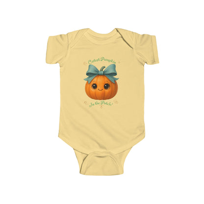 Infant bodysuit with kawaii pumpkin print and text ‘cutest pumpkin in the patch,’ styled with fall décor.