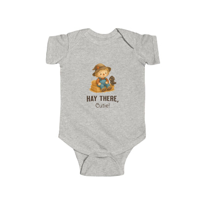 Seasonal baby onesie with cute scarecrow print and text Hay There Cutie
