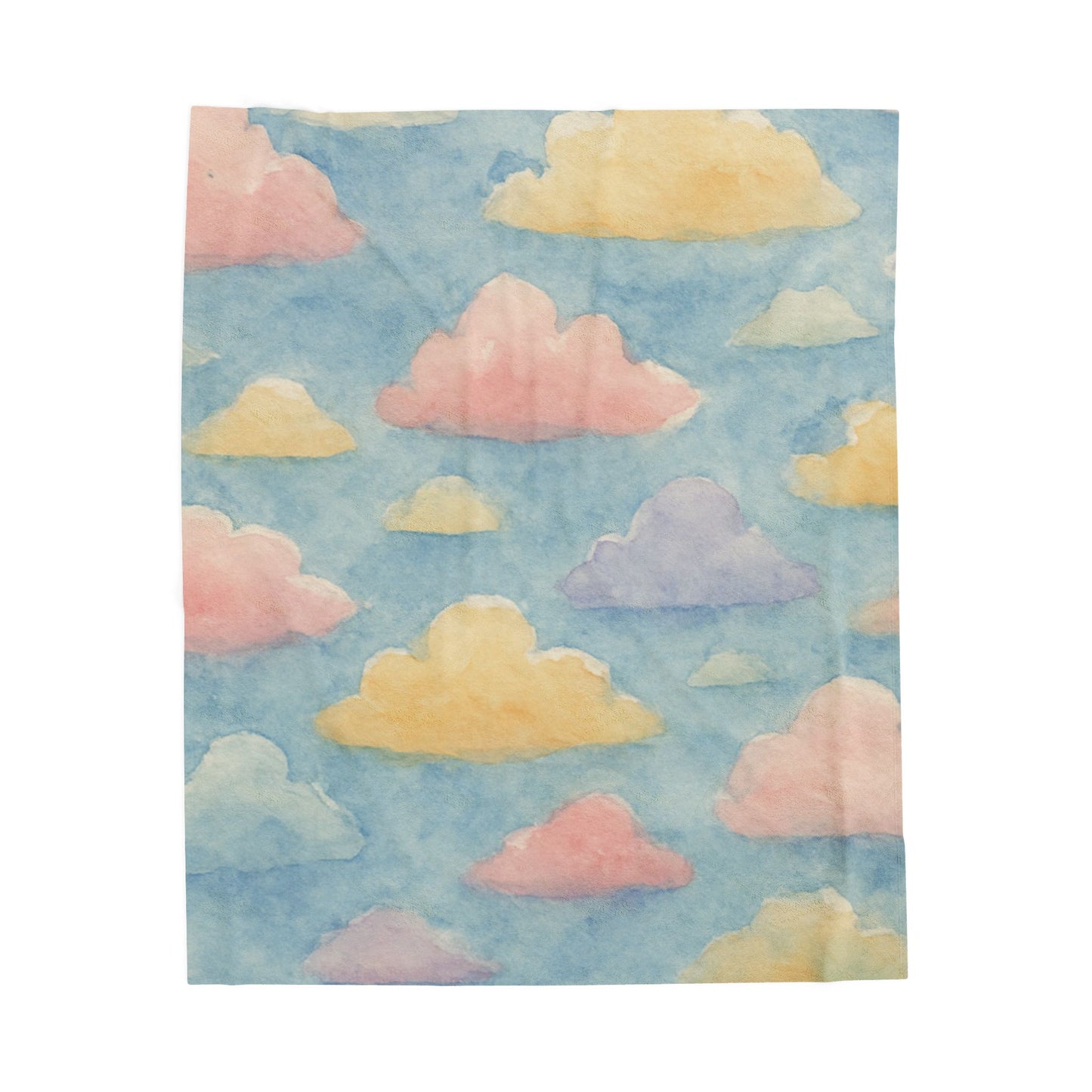 Watercolor cloud plush throw on light wooden bed