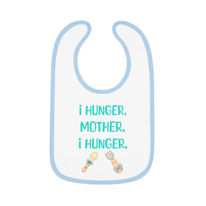 Baby bib with text 'i hunger, mother. i hunger.' and illustrations of a spoon and fork on a white background.