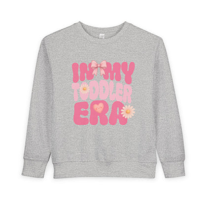 Gray toddler sweatshirt with pink “In My Toddler Era” text and bow design