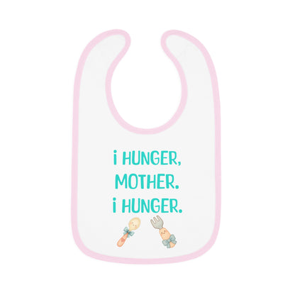 Baby bib with text 'i hunger, mother. i hunger.' and illustrations of a fork and spoon on a white background.