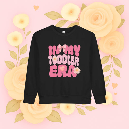 Cute toddler crewneck sweater with retro bubble letters and flower accents