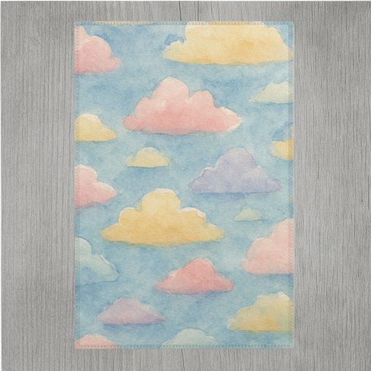Pastel rainbow watercolor cloud area rug with vibrant soft colors and hemmed edges for durability, designed for modern home décor.