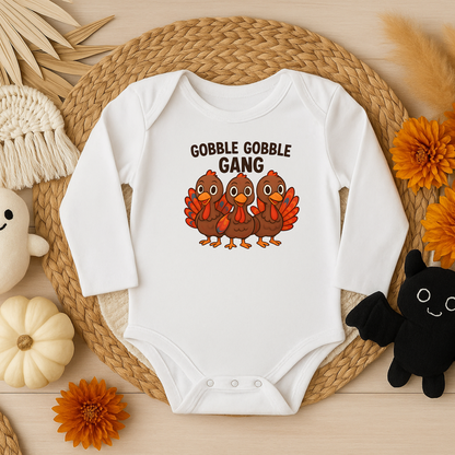 Cute Thanksgiving turkey baby onesie with festive turkey design